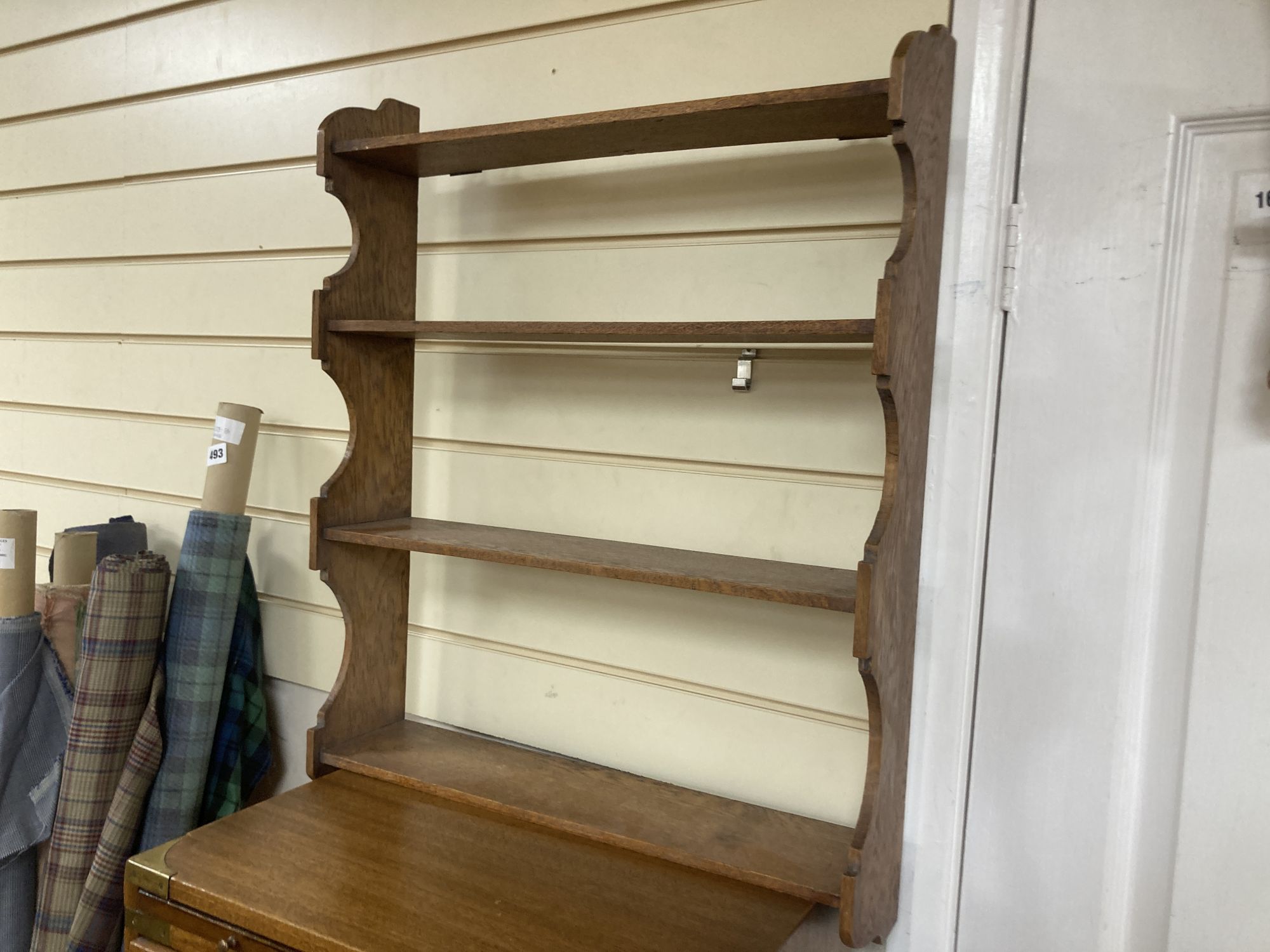 Two reproduction military-style chests, larger width 68cm, depth 38cm, height 69cm together with an oak wall bracket